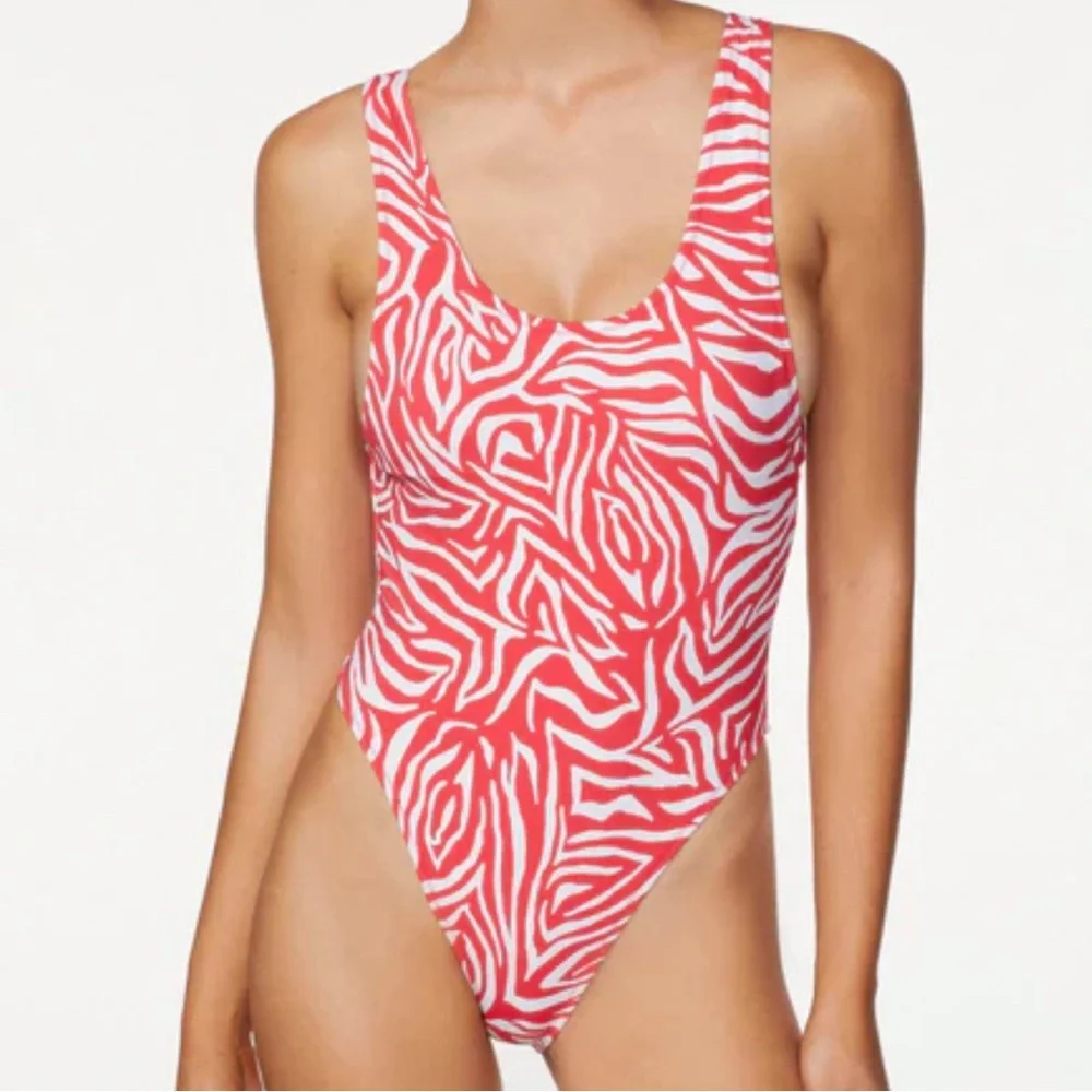 NWT FP x ITS NOW COOL the showtime one piece in fuego Zebra red white size small